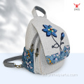 Mochila multifuncional de lino y algodón con patchwork floral